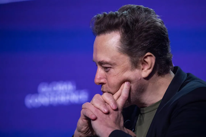 elon-musk-thinking-side-face-purple