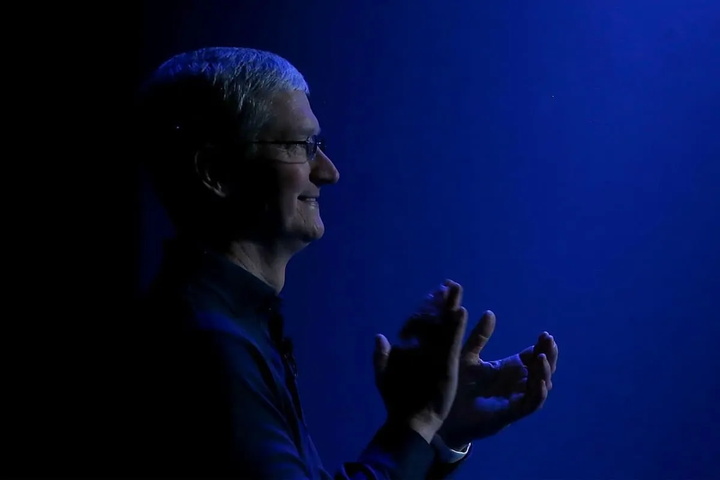 tim-cook-apple-ceo-side-smile-happy-63d8b3e5733fadf748877c4f.webp